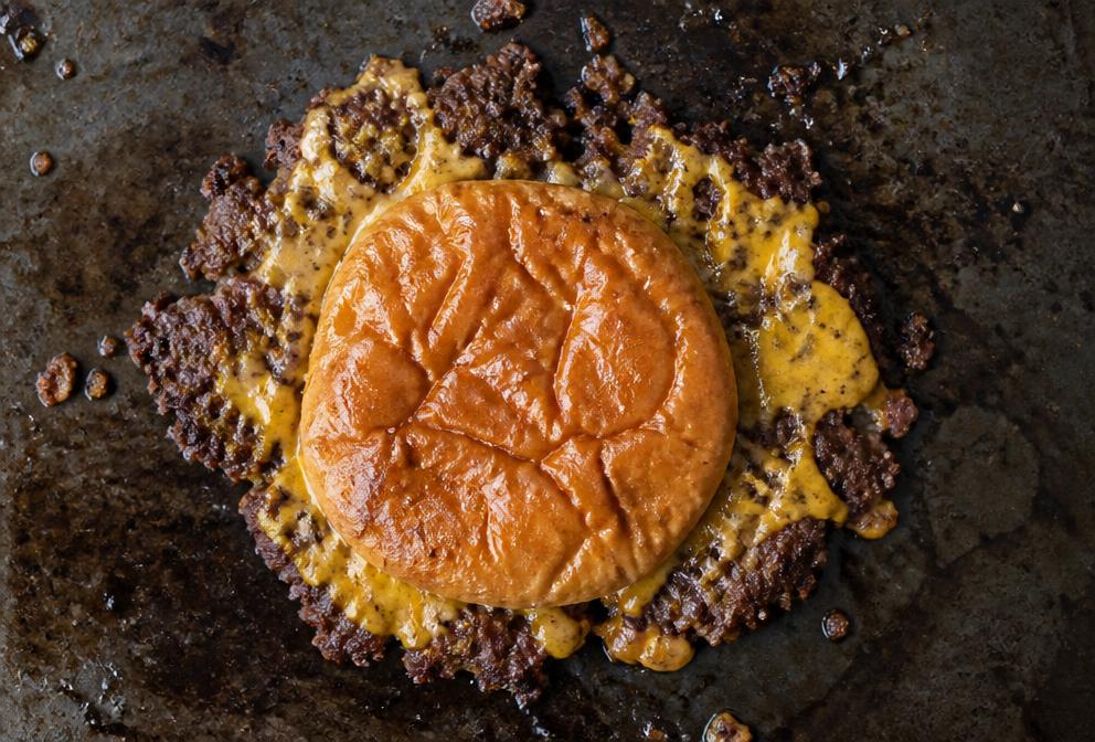 Top down view of a smashed beef burger